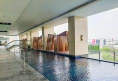 Swimming Pool 4 Cozy and Comfort Studio Apartment at B Residence By Travelio