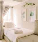 BEDROOM Cozy and Simple Living Studio Room at Poris 88 Apartment By Travelio