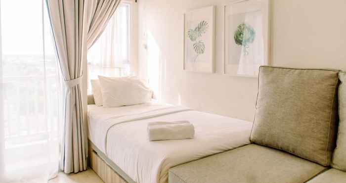 Bedroom Cozy and Simple Living Studio Room at Poris 88 Apartment By Travelio