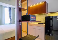 Bedroom 3 Tidy and Restful Studio at Evenciio Margonda Apartment By Travelio