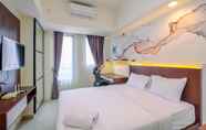 Kamar Tidur 2 Tidy and Restful Studio at Evenciio Margonda Apartment By Travelio