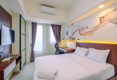 Bedroom 2 Tidy and Restful Studio at Evenciio Margonda Apartment By Travelio