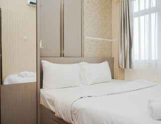 Bedroom 2 Spacious and Nice 2BR at Serpong Greenview Apartment By Travelio