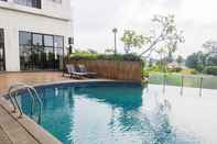 Swimming Pool Spacious and Nice 2BR at Serpong Greenview Apartment By Travelio