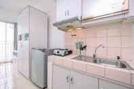 พื้นที่สาธารณะ Cozy and Simple Living Studio Apartment at Margonda Residence 3 By Travelio