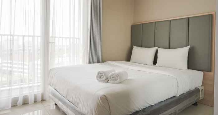 Kamar Tidur Comfort and Minimalist Studio at Ciputra International Apartment By Travelio