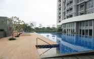 Swimming Pool 4 Comfort and Minimalist Studio at Ciputra International Apartment By Travelio