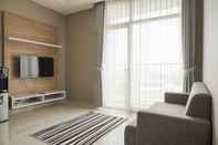 Common Space Comfort Living and Minimalist 1BR at Ciputra International Apartment By Travelio