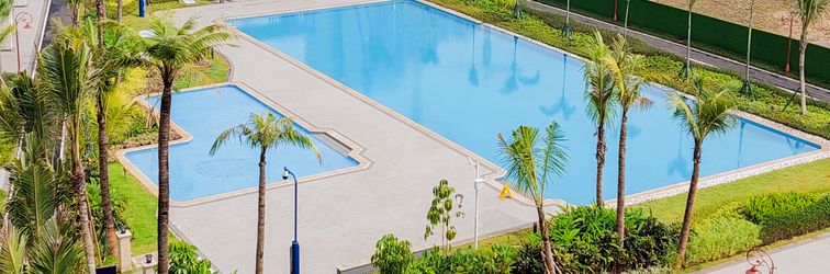 로비 Comfy Design 2BR with Washing Machine Sky House BSD Apartment By Travelio