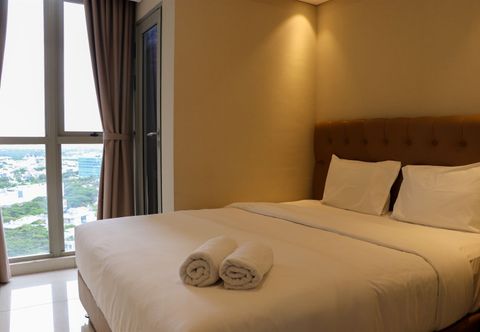 Bedroom Comfort and Minimalist 1BR at Gold Coast Apartment By Travelio