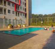 Swimming Pool 5 Cozy and Nice Studio at Monroe Tower Apartment By Travelio