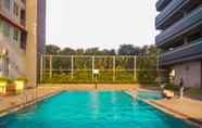 Swimming Pool 6 Cozy and Nice Studio at Monroe Tower Apartment By Travelio