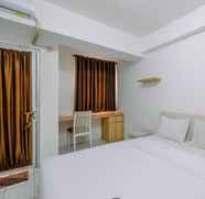 Bedroom 2 Homey and Modern Studio at Gunung Putri Apartment By Travelio