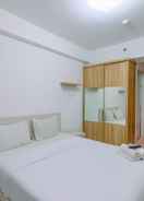 BEDROOM Homey and Modern Studio at Gunung Putri Apartment By Travelio
