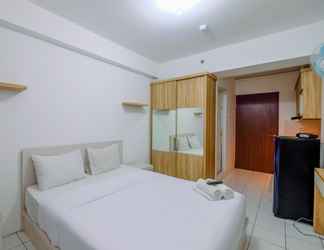 Bedroom 2 Homey and Modern Studio at Gunung Putri Apartment By Travelio