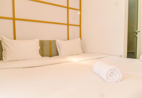 Bedroom Cozy Stay and Homey Studio at Serpong Garden Apartment By Travelio