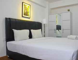 Bedroom 2 Comfy and Elegant Studio at Bassura City Apartment By Travelio