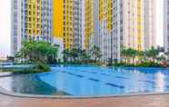 Swimming Pool 5 Comfort Living and Minimalist 2BR at Springlake Summarecon Bekasi Apartment By Travelio