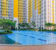 Swimming Pool 5 Comfort Living and Minimalist 2BR at Springlake Summarecon Bekasi Apartment By Travelio