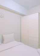 BEDROOM Comfort Living and Minimalist 2BR at Springlake Summarecon Bekasi Apartment By Travelio