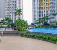 Swimming Pool 7 Comfort Living and Minimalist 2BR at Springlake Summarecon Bekasi Apartment By Travelio