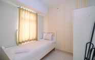 Bedroom 2 Comfort Living and Minimalist 2BR at Springlake Summarecon Bekasi Apartment By Travelio