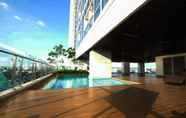 Kolam Renang 5 Cozy and Exclusive 2BR at Menteng Park Apartment By Travelio