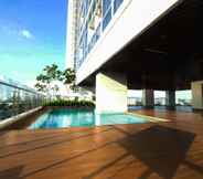 Kolam Renang 5 Cozy and Exclusive 2BR at Menteng Park Apartment By Travelio
