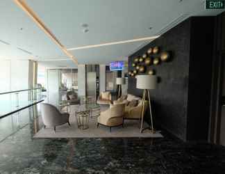 Lobby 2 Cozy Design Fully Furnished Studio at Menteng Park Apartment By Travelio