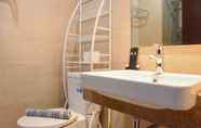 In-room Bathroom 3 Cozy Design Fully Furnished Studio at Menteng Park Apartment By Travelio