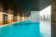 Kolam Renang Cozy Design Fully Furnished Studio at Menteng Park Apartment By Travelio