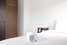 Bedroom Spacious and Nice 2BR Apartment at Pinewood near JATOS By Travelio