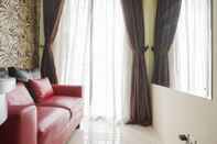 Ruang Umum Cozy Stay and Modern 1BR at Gardenia Boulevard Apartment By Travelio