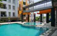 Kolam Renang 4 Cozy Stay and Modern 1BR at Gardenia Boulevard Apartment By Travelio