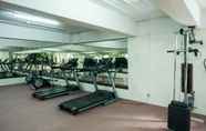 Fitness Center 6 Cozy Stay and Modern 1BR at Gardenia Boulevard Apartment By Travelio