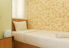 Bedroom 2 Cozy and Simply Living 2BR at Meikarta Apartment By Travelio