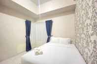 Bilik Tidur Pleasant and Comfy 2BR Apartment at Newton Residence By Travelio