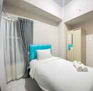 Bedroom 2 Pleasant and Comfy 2BR Apartment at Newton Residence By Travelio