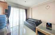 Common Space 3 Cozy Design and Serene 2BR Apartment at Gateway Pasteur By Travelio