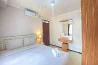 Bedroom Cozy Design and Serene 2BR Apartment at Gateway Pasteur By Travelio