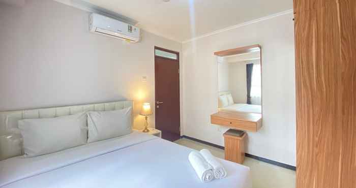 Bedroom Cozy Design and Serene 2BR Apartment at Gateway Pasteur By Travelio