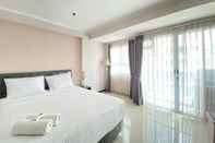 Bedroom Deluxe & Cozy 1BR Apartment at Gateway Pasteur By Travelio
