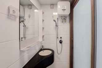 In-room Bathroom 4 Comfort and Cozy Living Studio at Sky House BSD Apartment By Travelio