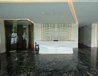 Lobby 2 Elegant and Spacious 3BR at Menteng Park Apartment By Travelio