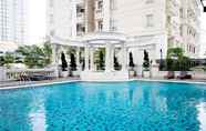 Swimming Pool 5 Homey and Warm 1BR The Bellezza Apartment By Travelio