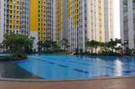 Swimming Pool Comfort and Simply 2BR at Springlake Summarecon Bekasi Apartment By Travelio