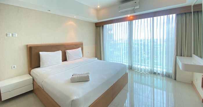 Kamar Tidur Deluxe and Simply Studio at Tamansari La Grande Apartment By Travelio