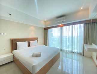 Bedroom 2 Deluxe and Simply Studio at Tamansari La Grande Apartment By Travelio