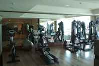 Fitness Center Deluxe and Simply Studio at Tamansari La Grande Apartment By Travelio