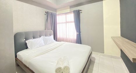 Bedroom 2 Relaxing and Cozy 2BR Apartment at Newton Residence By Travelio